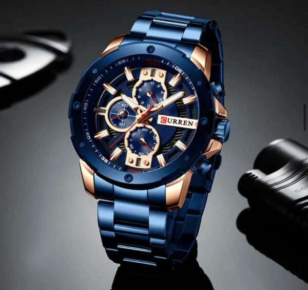 Reloj curren correa y fondo azul con bordes dorados